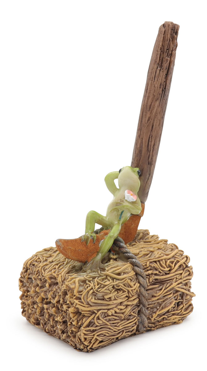 Frog Erwin on hay bale, 