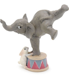 Elephant doing a handstand, with bunny
