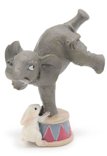 Elephant doing a handstand, with bunny